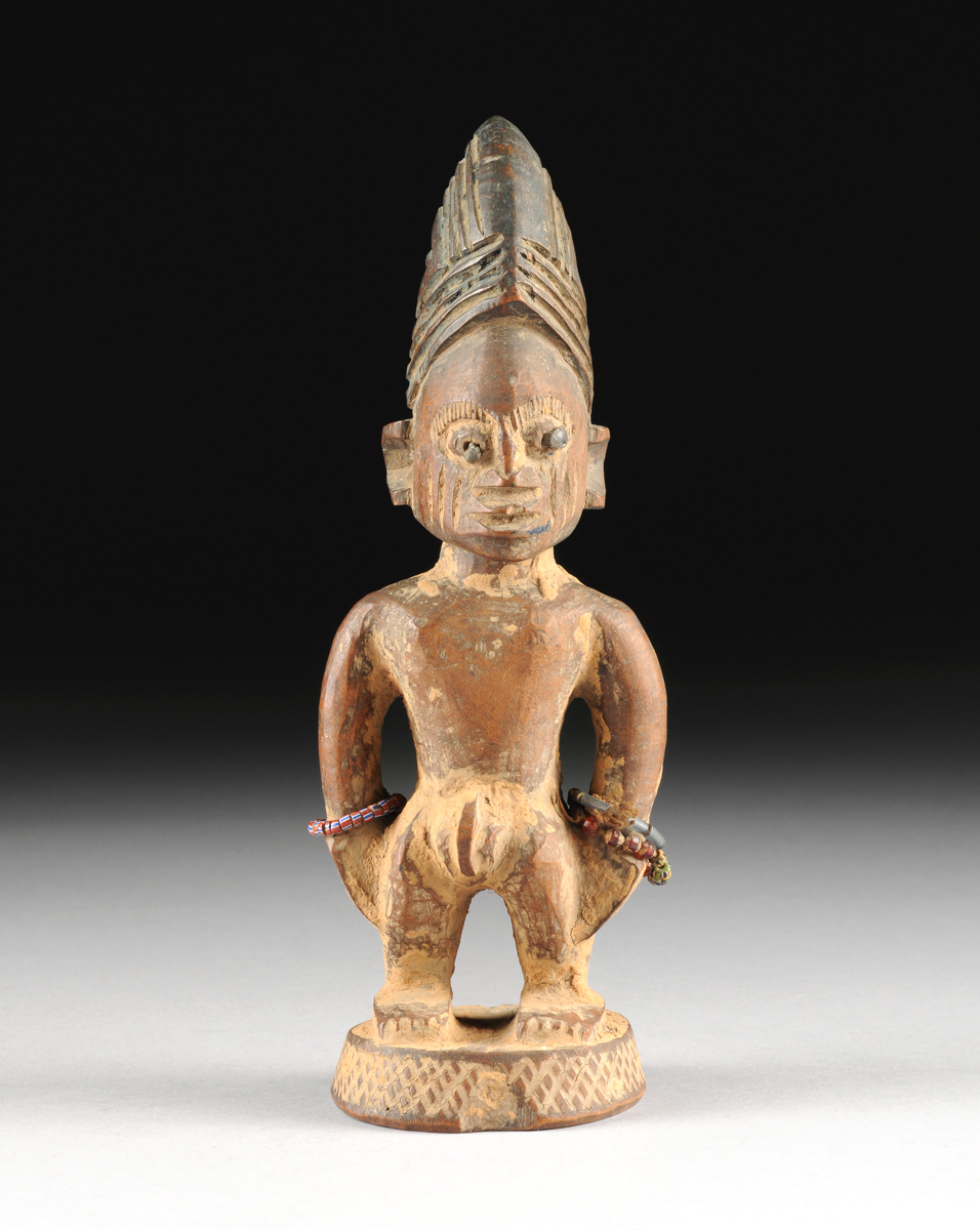 A YORUBA CARVED WOOD MALE TWIN IBEJI FIGURE, NIGERIA, LATE 19TH/EARLY ...