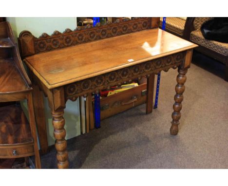 Victorian carved oak side table on bobbin turned legs