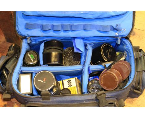 Camera bag, containing lenses, flash, tripod, etc