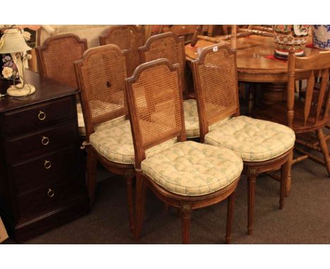 Set of six French oak bergere panel back salon chairs
