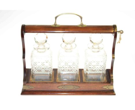 Silver-plate mounted three decanter tantalus