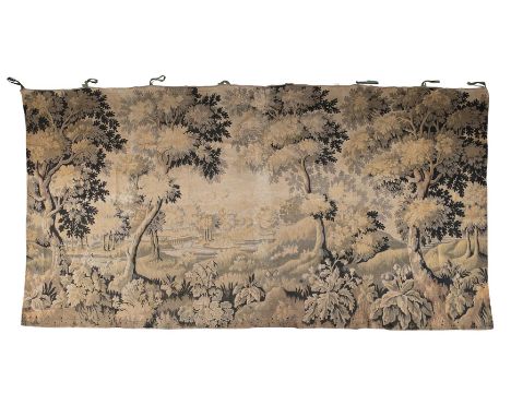 A VERDURE STYLE TAPESTRY WALL HANGING, early 20th century, depicting a wooded river landscape, in earthen tones.  174 x 320cm