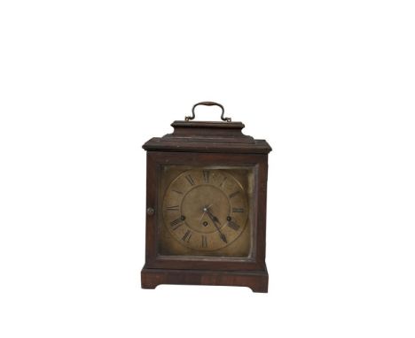 A GEORGIAN STYLE MAHOGANY AND BEECH CASED BRACKET CLOCK, the rectangular case surmounted with raised brass handle, the glazed