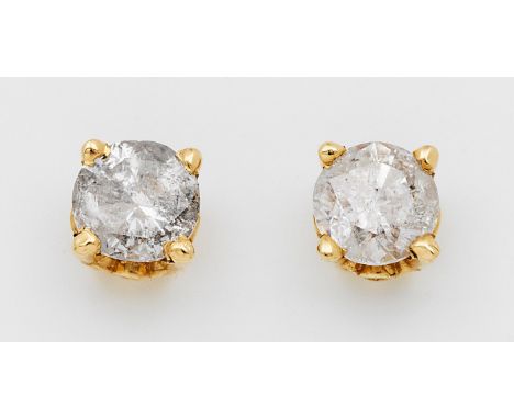 Paar klassische Brillantsolitär-Ohrstecker Gelbgold, gest. 14 k. Zentral besetzt mit je einem Brillanten von zus. ca. 1,00 ct