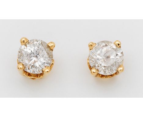 Paar klassische Brillantsolitär-Ohrstecker Gelbgold, gest. 14 k. Zentral besetzt mit je einem Brillanten von zus. ca. 0,82 ct