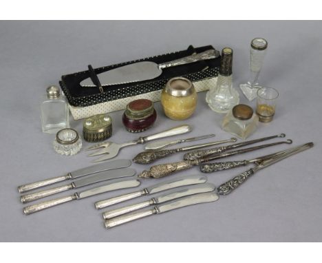 Three silver-handled button hooks; a similar pair of glove-stretchers; numerous glass receptacles, etc.