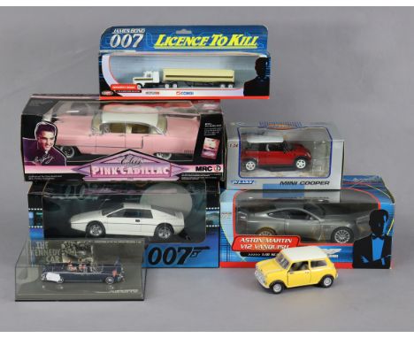 An MRC large scale die-cast model of “Elvis’s 1955 Pink Cadillac”; three various 007 die-cast scale models; &amp; three vario