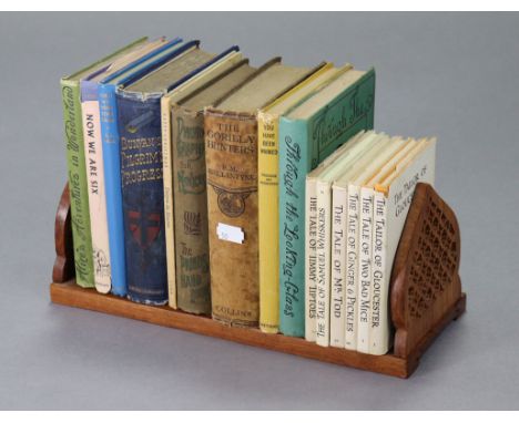 Various children’s books; together with various other volumes &amp; a teak adjustable book trough.