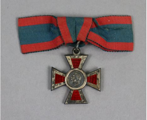 The Royal Red Cross, George V, in silver &amp; red enamel, with ribbon.