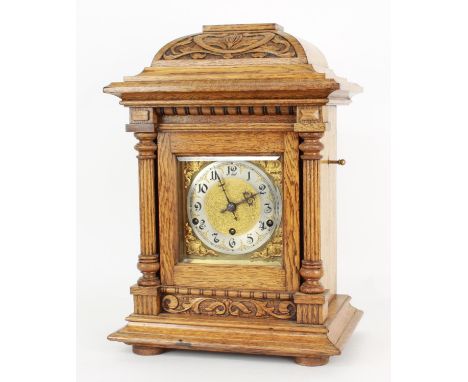 Light oak cased three train mantel clock, the Kienzle movement no. 37131 striking on five rods, the 6.25" square brass dial p