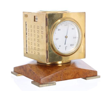 Good multi-functional brass desk piece, the cubed case fitted with a clock timepiece, barometer and temperature dials and wit