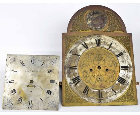 Eight day longcase clock movement, the 14" brass arched dial with silvered chapter ring enclosing a foliate engraved centre w