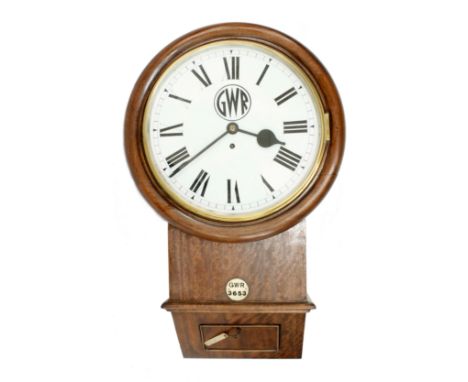 Great Western Railway (G.W.R) mahogany single fusee 12" drop dial wall clock within a turned surround, bearing a circular ivo