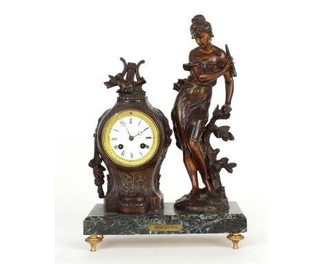 French bronzed two train figural mantel clock striking on a bell,&nbsp;the 3" white dial within an ornate balloon shaped casi