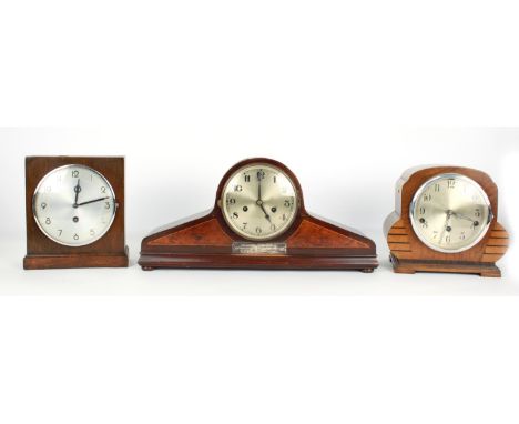 Oak three train Napoleon hat mantel clock, the movement striking on five rods, the 7" gilt dial within a carved case, 11.5" h