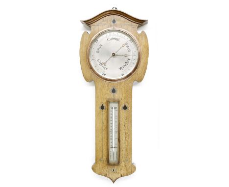 Arts &amp; Crafts oak inlaid barometer/thermometer, the stylised inlaid case inset with an 8" silvered barometer dial with st