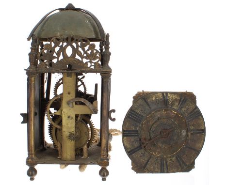 Antique English brass lantern clock in need of restoration, the 6.5" brass chapter ring enclosing a foliate engraved centre w