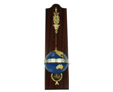 Devon clock globe timepiece, the movement contained within a blue metal globe with raised gilt continents, with silvered hori