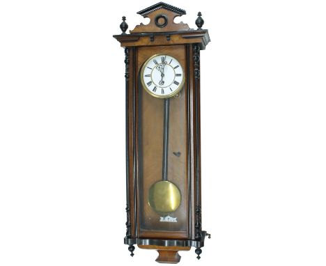 Walnut and ebonised single weight Vienna regulator wall clock, the 6.25" white enamel dial with subsidiary seconds dial, with