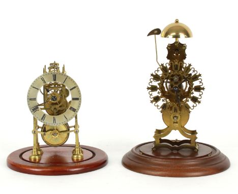 Contemporary small single fusee brass skeleton mantel clock, the 3.75" silvered dial and movement upon square supports and st