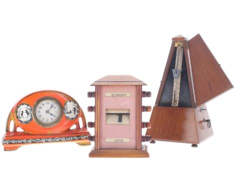 Small pottery mantel clock&nbsp;timepiece; also a wooden cased ticket clock, 6" high and a Maelzel walnut cased pyramid metro