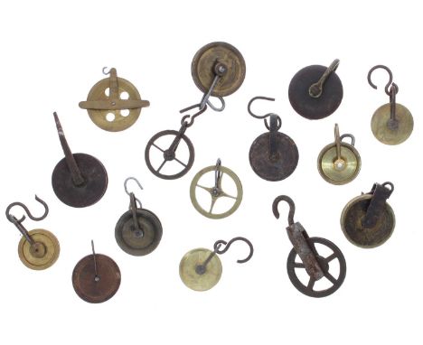 Twelve Longcase clock pulleys and three regulator pulleys; also six pairs of pulleys 