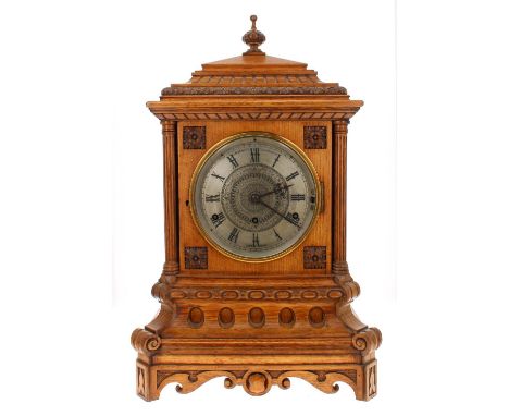 Good English light oak triple fusee chiming gothic clock, the 7.5" silvered chapter ring signed J.W. Benson, 25 Old Bond St, 