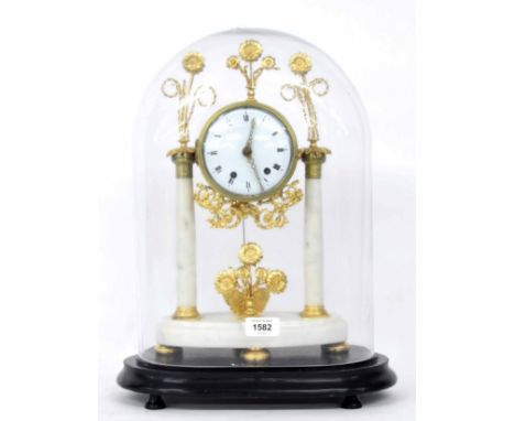 Drumhead white marble and gilt metal mounted portico two train mantel clock striking on a bell, the 4" white dial within a dr