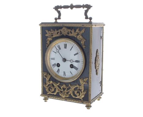 French ebonised and gilt metal mounted two train mantel clock, the movement back plate bearing the makers trademark logo and 