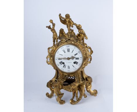 Figurenpendule, "Komödianten", Paris, um 1770/80, Bronze, vergoldet, rocailliertes Gehäuse, seitlich eingezogen, mit fünf Kom