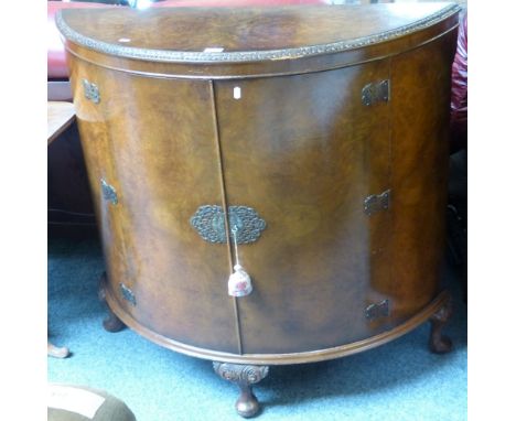 A 19th century mahogany rounded oblong tip-top tripod table 66cm wide.