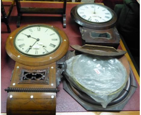 A Victorian mahogany drop dial wall clock the white enamel dial with Roman numerals, pendulum, another similar together with 
