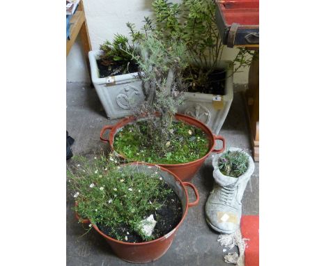 A pair of composition garden urns together with two tin baths, composition planter in the form of a boot. (5)