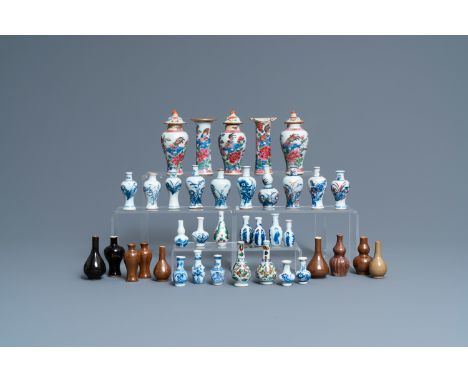 Full title: Thirty-eight Chinese blue and white, famille rose and monochrome miniature vases, Kangxi/QianlongDescription:H.: 