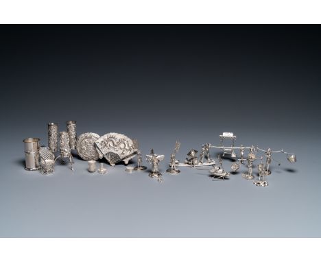 Full title: A collection of Chinese silver miniatures, a powder box and a table ornament, 19/20th C.Description:L.: 10,5 cm -