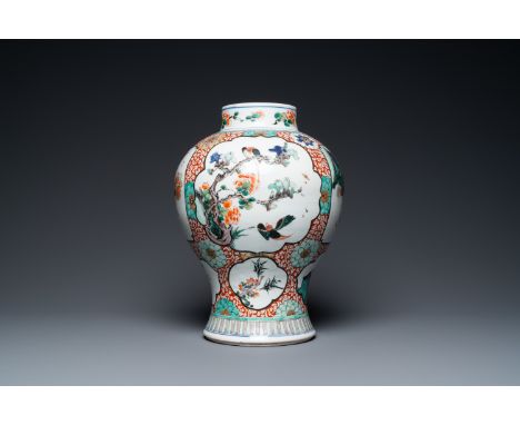 Full title: A Chinese famille verte vase with birds near flowery branches, KangxiDescription:H.: 34 cmThe absence of a condit