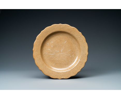 Full title: A Chinese ge-type crackle-glazed light brown-ground dish, QianlongDescription:Dia.: 28 cmThe absence of a conditi