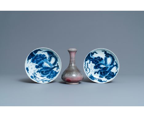 Full title: A pair of Chinese blue and white 'dragon' plates and a monochrome copper-red vase, Kangxi and laterDescription:H.