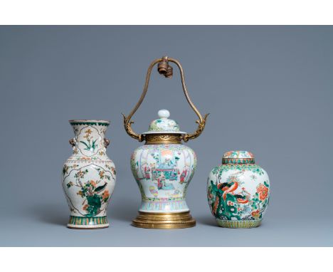 Full title: Two Chinese famille verte vases and a lamp-mounted famille rose vase, 19th C.Description:H.: 57,5 cm (the tallest