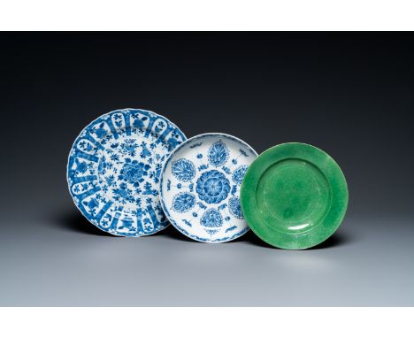 Full title: Two Chinese blue and white dishes and a green monochrome plate, KangxiDescription:Dia.: 27 cm (the largest)The ab