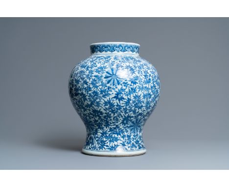 Full title: A Chinese blue and white 'lotus scroll' vase, QianlongDescription:H.: 45 cmThe absence of a condition report does