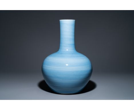 Full title: A large Chinese monochrome 'tianqiu ping' claire de lune vase, 19th C.Description:H.: 54,5 cmThe absence of a con