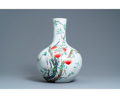 Full title: A Chinese famille rose 'tianqiu ping' 'nine peaches' vase, Qianlong mark, 20th C.Description:H.: 57 cmThe absence