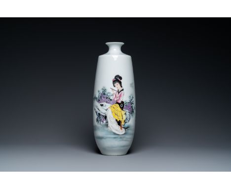 Full title: A Chinese famille rose vase with a lady on a rock, Jingdezhen zhi mark, 20th C.Description:H.: 50,5 cmThe absence