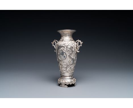 Full title: A Chinese silver 'Fu' vase, 19/20th C.Description:H.: 22 cmÊ Weight: 484 gÊ The vase with a monogram on the insid