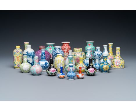 Full title: Twenty-eight Chinese blue and white and famille rose minature vases, Kangxi and laterDescription:H.: 8 cm (the ta