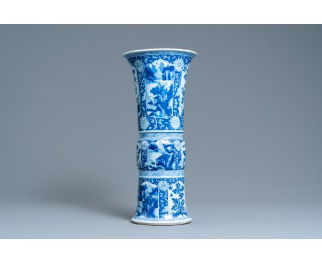 Full title: A Chinese blue and white 'gu' vase with floral and lanscape panels, KangxiDescription:H.: 54,5 cmThe absence of a