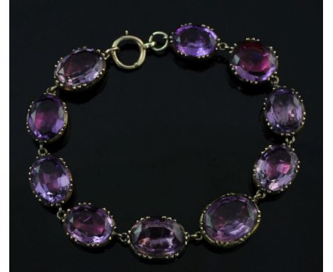 A 19th century 9ct gold and foil backed amethyst bracelet, length approximately 6.5in. A 19th century 9ct gold and foil backe