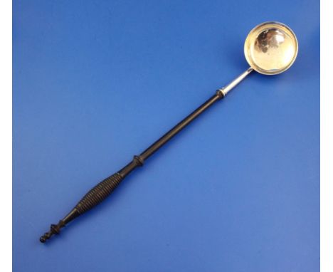 A George IV Scottish silver toddy ladle, 15.25in. A George IV Scottish silver toddy ladle, with turned wooden handle, George 