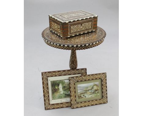 An early 20th century Indian ivory and bone inlaid circular tripod table, table W.1ft 8in. An early 20th century Indian ivory